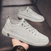 Zapatillas deportivas blancas de moda para hombre, de primavera y estilo salvaje.
